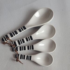 Set Of 4 Ceramic Striped Black And White Measuring Spoons.